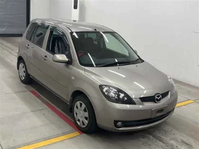 Mazda DEMIO  с аукциона в Японии