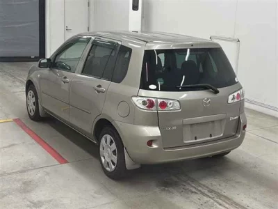 Mazda DEMIO  с аукциона в Японии