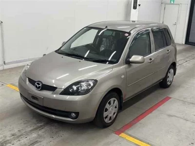 Mazda DEMIO  с аукциона в Японии