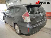 Toyota PRIUS ALPHA лот № 3002 оценка 3.5  с аукциона в Японии 1