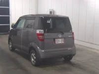 Honda ZEST лот № 1097 оценка R  с аукциона в Японии 1