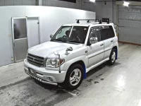 Mitsubishi PAJERO IO лот № 2106 оценка 3  с аукциона в Японии 3