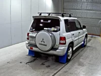 Mitsubishi PAJERO IO лот № 2106 оценка 3  с аукциона в Японии 4