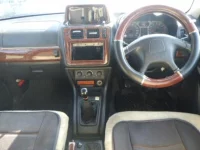 Mitsubishi PAJERO IO лот № 2106 оценка 3  с аукциона в Японии 2