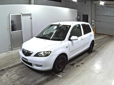 Mazda DEMIO  с аукциона в Японии