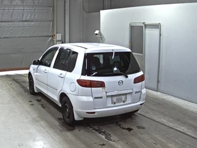 Mazda DEMIO  с аукциона в Японии