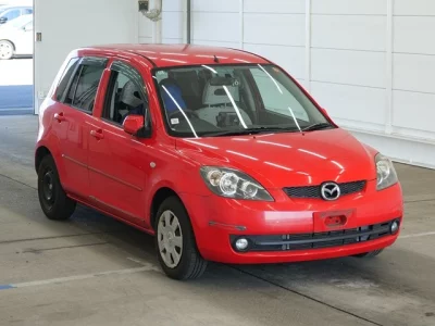 Mazda DEMIO  с аукциона в Японии