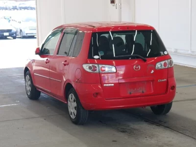 Mazda DEMIO  с аукциона в Японии
