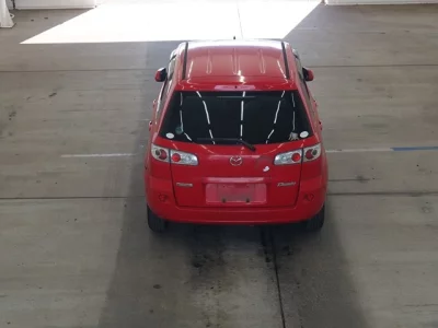 Mazda DEMIO  с аукциона в Японии