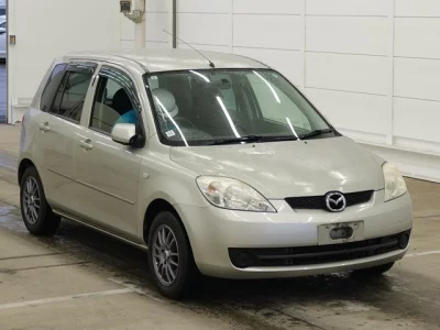 Mazda DEMIO  с аукциона в Японии