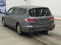 Honda ODYSSEY лот № 2243 оценка RA  с аукциона в Японии 1