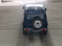 Suzuki JIMNY SIERRA лот № 2143 оценка 3.5  с аукциона в Японии 2