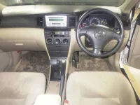 Toyota COROLLA RUNX лот № 8135 оценка 3.5  с аукциона в Японии 2