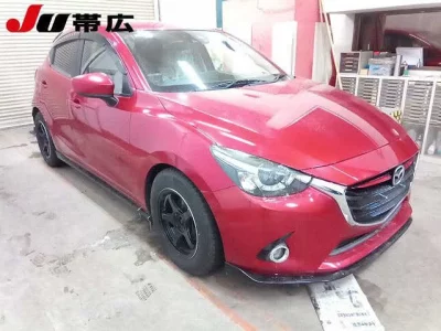 Mazda DEMIO  с аукциона в Японии