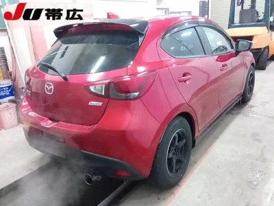 Mazda DEMIO  с аукциона в Японии
