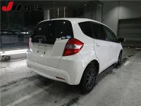 Honda FIT лот № 1557 оценка R  с аукциона в Японии 1