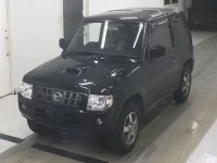 Nissan KIX лот № 32 оценка 3  с аукциона в Японии 3