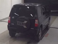 Nissan KIX лот № 32 оценка 3  с аукциона в Японии 4