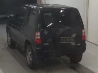 Nissan KIX лот № 32 оценка 3  с аукциона в Японии 1