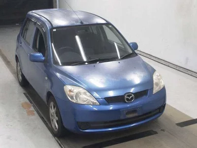 Mazda DEMIO  с аукциона в Японии