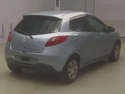 Mazda DEMIO  с аукциона в Японии