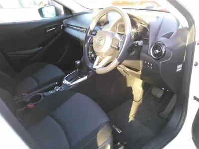 Mazda DEMIO  с аукциона в Японии