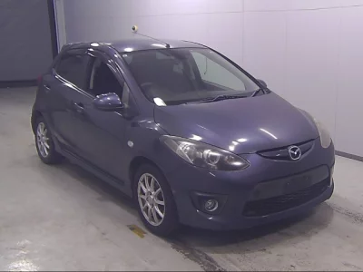 Mazda DEMIO  с аукциона в Японии
