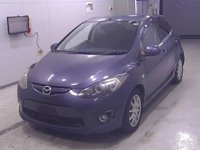 Mazda DEMIO  с аукциона в Японии