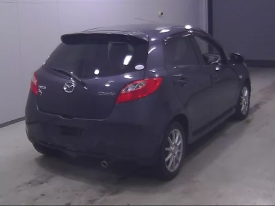 Mazda DEMIO  с аукциона в Японии