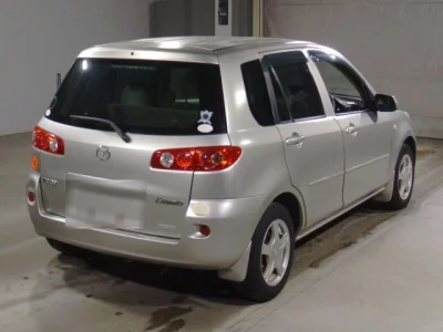 Mazda DEMIO  с аукциона в Японии