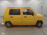 Daihatsu NAKED лот № 563 оценка RA  с аукциона в Японии 2