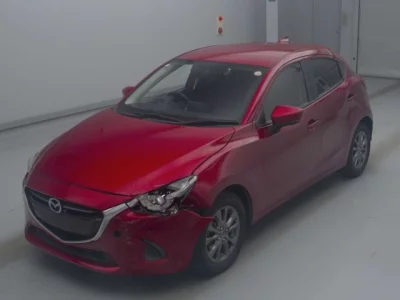 Mazda DEMIO  с аукциона в Японии