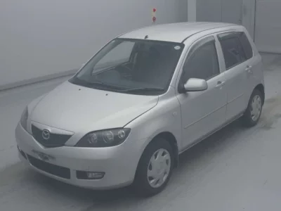 Mazda DEMIO  с аукциона в Японии