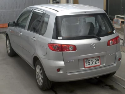 Mazda DEMIO  с аукциона в Японии