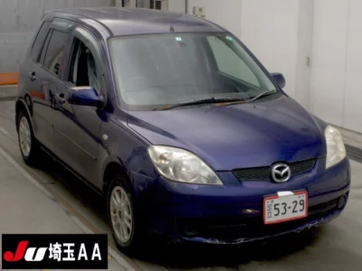 Mazda DEMIO  с аукциона в Японии