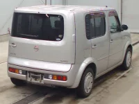 Nissan CUBE лот № 5521 оценка RA  с аукциона в Японии 1