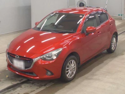 Mazda DEMIO  с аукциона в Японии