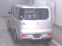 Nissan CUBECUBIC лот № 4077 оценка 3.5  с аукциона в Японии 1