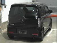 Mitsubishi EK SPORTS лот № 570 оценка 3.5  с аукциона в Японии 1