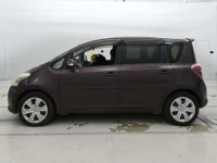 Toyota RACTIS лот № 30094 оценка 4  с аукциона в Японии 3