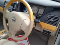 Nissan SYLPHY лот № 36551 оценка 4  с аукциона в Японии 8