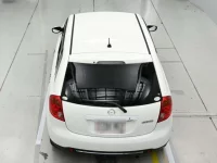 Mazda VERISA лот № 30577 оценка RA  с аукциона в Японии 7