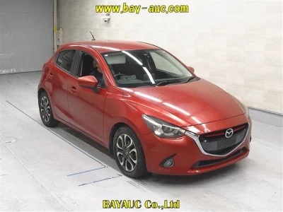 Mazda DEMIO  с аукциона в Японии