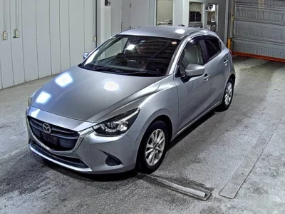 Mazda DEMIO  с аукциона в Японии