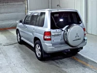Mitsubishi PAJERO IO лот № 1096 оценка 3.5  с аукциона в Японии 1