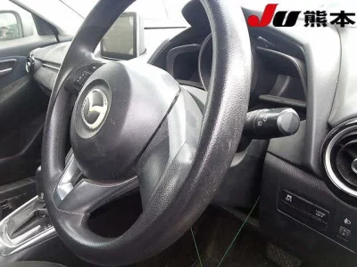 Mazda DEMIO  с аукциона в Японии
