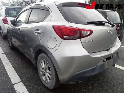 Mazda DEMIO  с аукциона в Японии