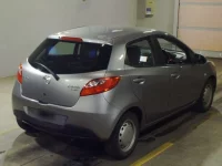 Mazda DEMIO лот № 6031 оценка RA  с аукциона в Японии 1