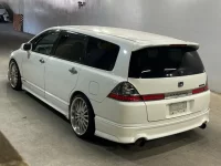 Honda ODYSSEY лот № 1048 оценка 3.5  с аукциона в Японии 1