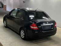 Nissan TIIDA LATIO лот № 1029 оценка 3.5  с аукциона в Японии 1